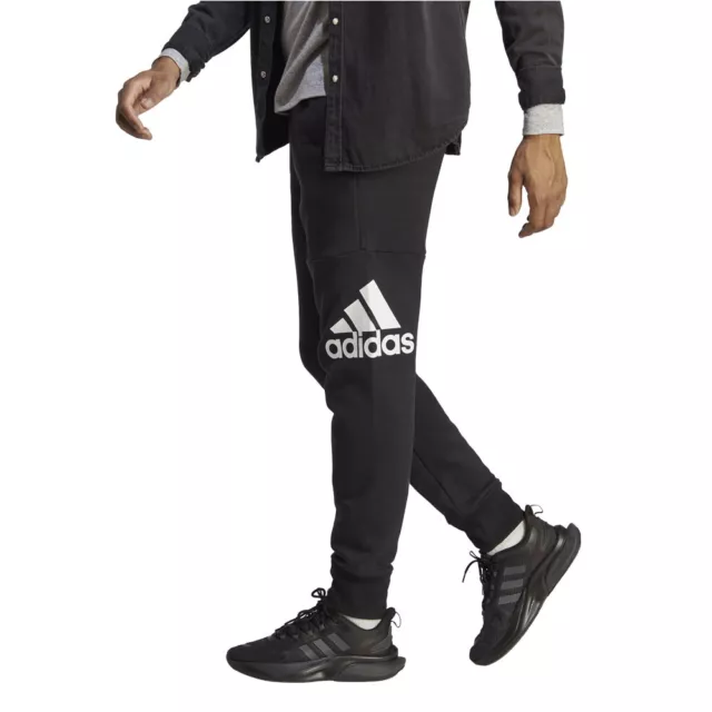 Pantalone uomo garzato polsino Adidas Essentials HA4342 nero-bianco