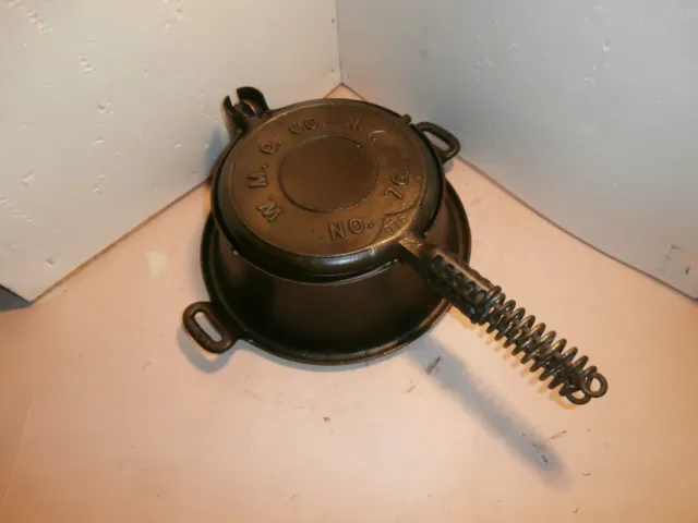 vintage cast iron skillet  waffle maker W.M.C. Co. No. 76 high base