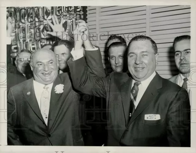 1955 Press Photo Richard Daley and Morris Sachs in victory pose in Chicago.