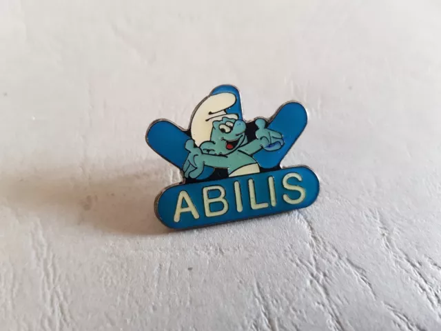 Pin's BD SCHTROUMPF - Abilis - Smurf - Puffi - Pitufos - Schlumpf