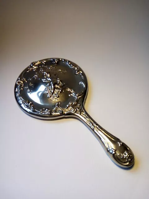 Antique Late Victorian Embossed Cherub Silver Plate Vanity Hand Mirror