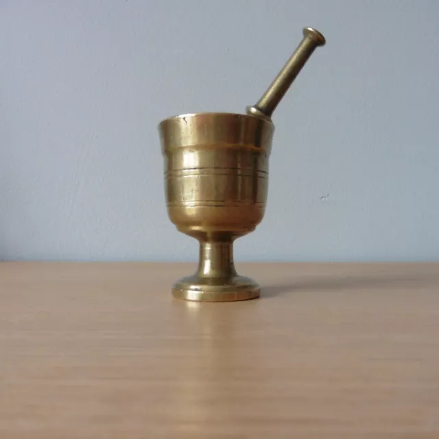 An antique continental 19th century  bronze mortar and pestle heavy cast