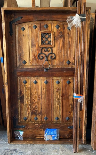 Rustic reclaimed lumber square door solid wood storybook castle winery speakeasy