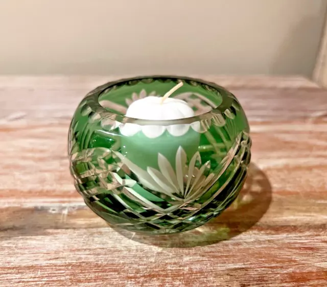 Green glass shop tea light holders