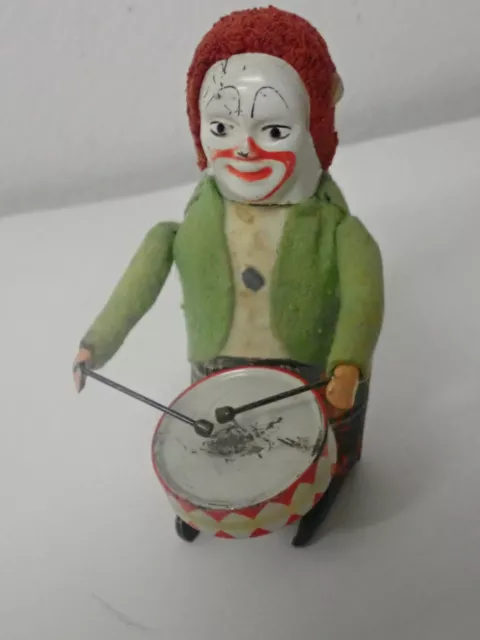 Antike Schuco Tanzfigur Clown als Trommler guter Zustand voll intakt