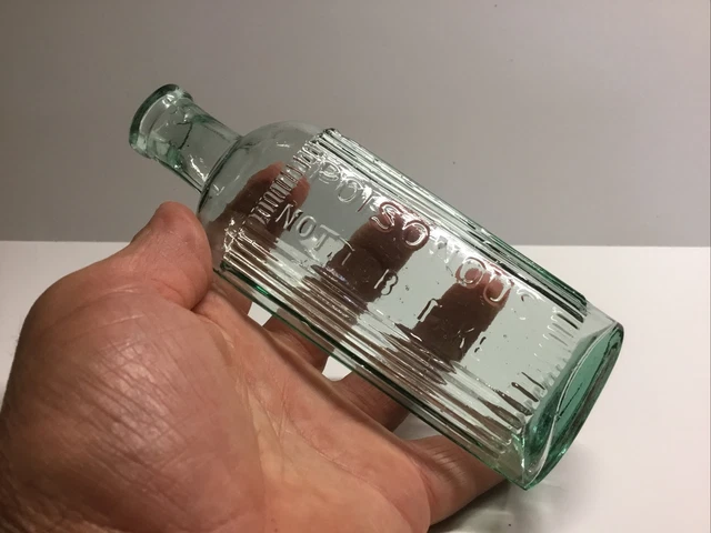 Small Oval Antique Poisonous NTBT Poison Bottle.