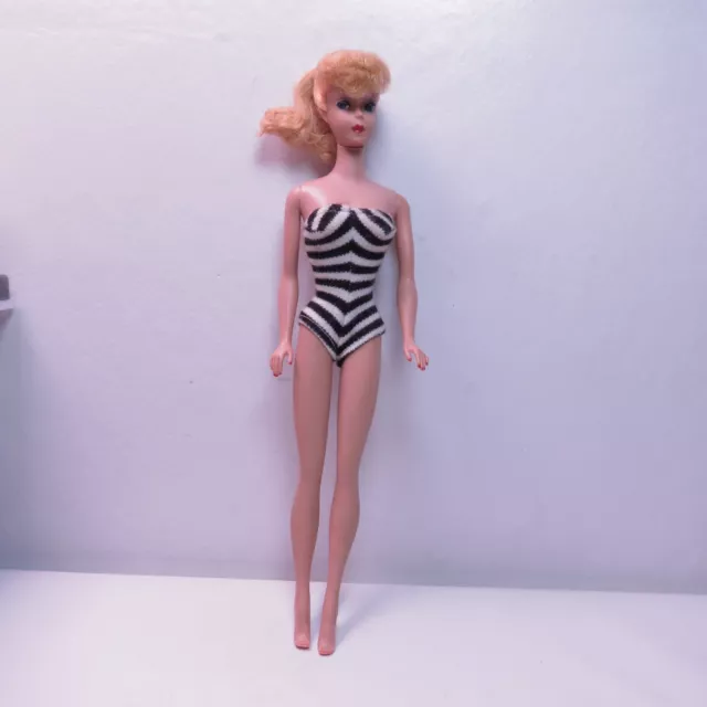 1960’s Vintage #3/4 Blonde Ponytail With Zebra Swimsuit See images
