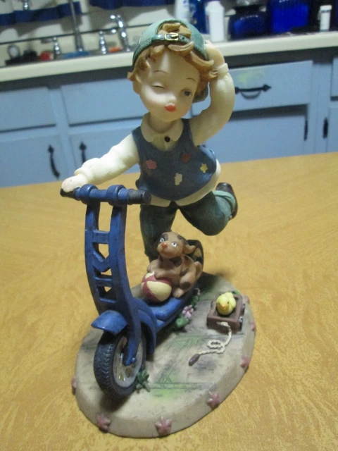 Figurine Boy on Scooter w/ Dog 6.5"H Montefiori Collection