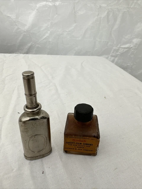 Película de seguridad vintage Kodak botella vacía de cemento más botella de metal con parte superior de tornillo