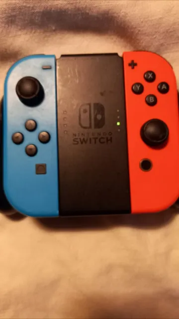 Nintendo Joy-Con Paire de Manettes de Jeu pour Nintendo Switch - Rouge Néon/Bleu