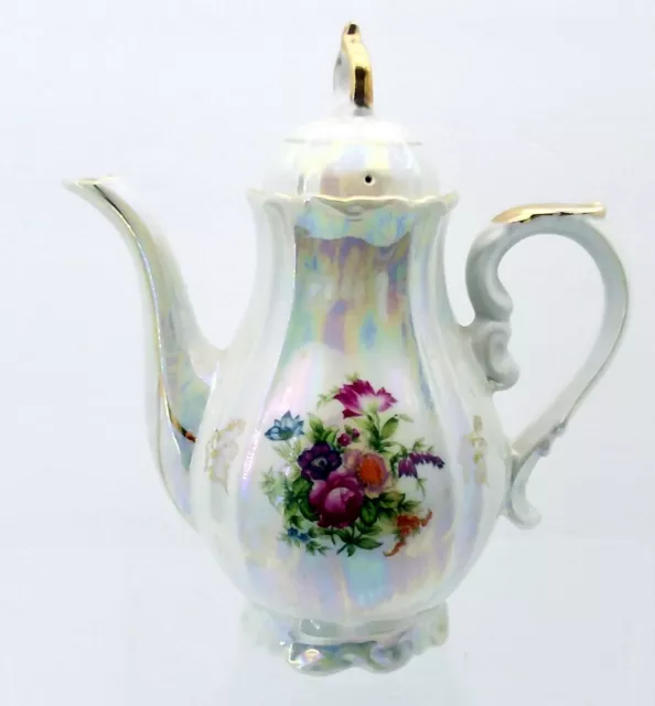 https://www.picclickimg.com/BLUAAOSwxnllCe5c/Vintage-Fresh-Lusterware-Iridescent-Teapot-7-1-2.webp