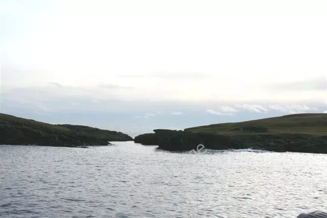 Photo 6x4 The Calf of Linga on the left separated by a small channel from c2009