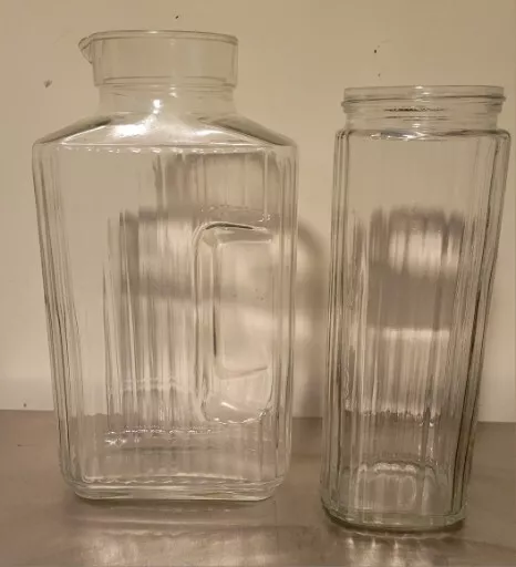 https://www.picclickimg.com/BOIAAOSwHGpkwxg1/Two-Vintage-Embossed-Clear-Glass-Refrigerator-Jars-Juice-Water.webp
