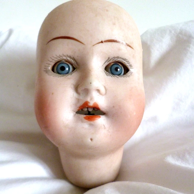 Lot-Art | Tête de poupée de porcelaine, (allemande XIXe), numérotée et