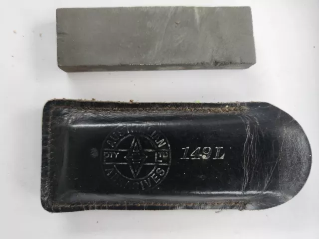 Vintage Australian Abrasive Sharpening  Stone. In original leather holder