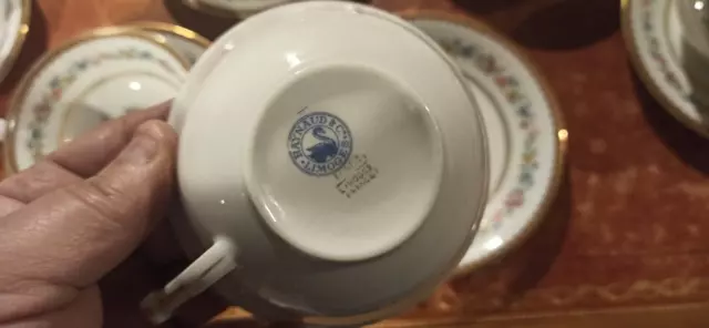 12 tasses et sous tasses à thé en porcelaine de Limoges Raynaud + pot à lait. 2