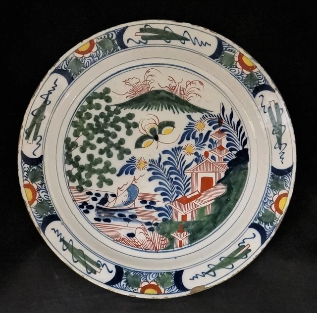18th c. English Delft charger w/polychrome glaze - lake scene & sailboat. 13 ¾”