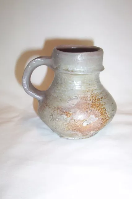 Raeren stoneware drinking mug c. 16th century.     Bellarmine krug