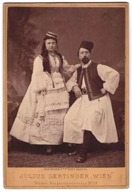 Photography Julius Gertinger, Vienna, portrait couple in Greek costume with foot