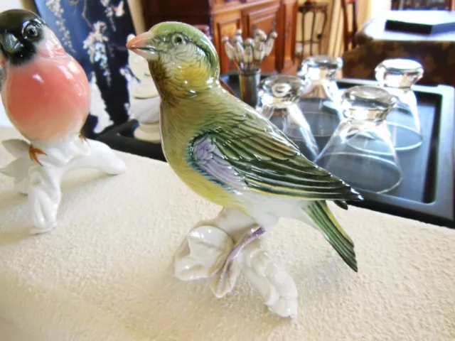 Beautiful vintage porcelain figurine female crossbill.  signed KE