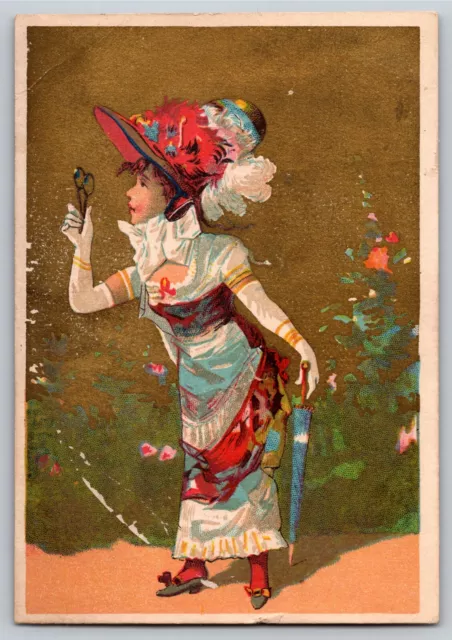 Wm. Thum, Druggist Grand Rapids Victorian Trade Card Girl in Fancy Dress - Gilt