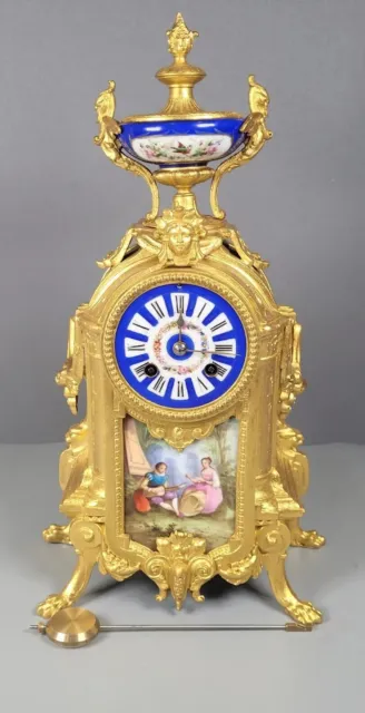 French gilt spelter and Sèvres style porcelain mantel clock