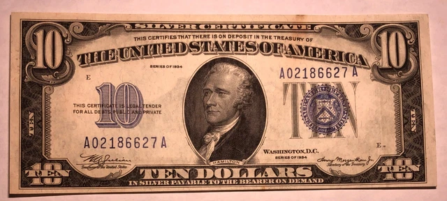 1934 $10 blue seal silver certificate FR1701. Crisp AU+, minor staining. #me128