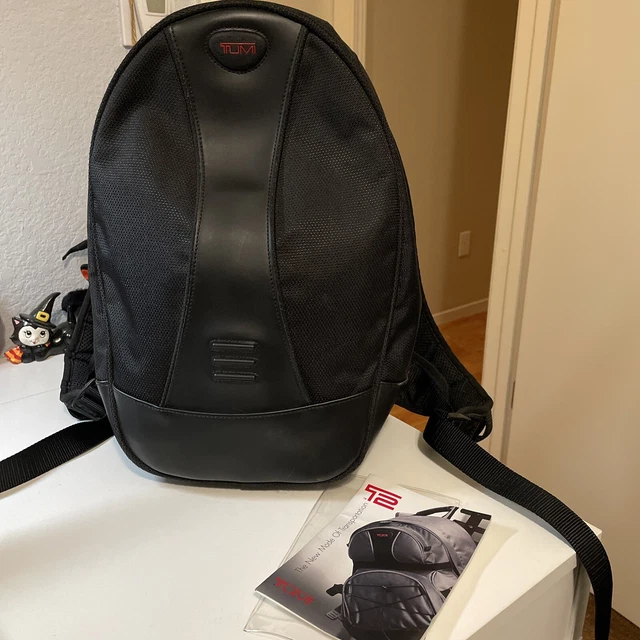 tumi black nylon mesh leather bullet backpack