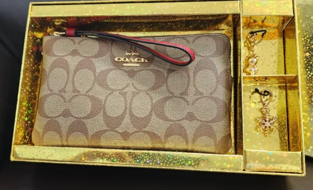 Coach Boxed Large Corner Zip Wristlet In Signature Canvas C1748