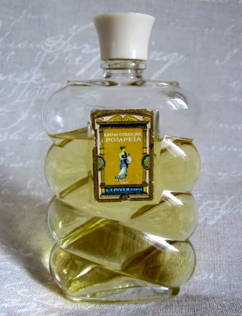 ANCIEN FLACON EAU DE COLOGNE POMPEIA de L.T. PIVER étiquette verte Or 3/4 plein