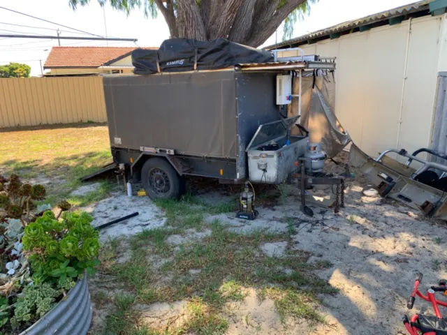 trailer. Rooftop tent, gas instant hot water wood decking 12 months rego New tir