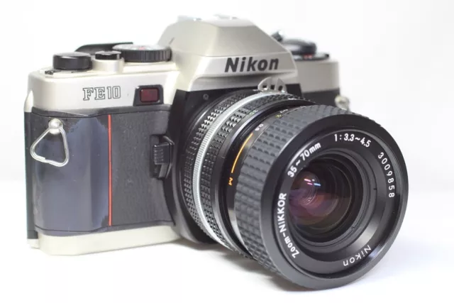 Excelente cámara de película Nikon FE10 SLR de 35 mm y lente Nikkor con... 2