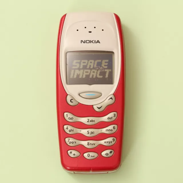 Vintage Nokia 3315 Red Mobile Phone from 2002 with Charger