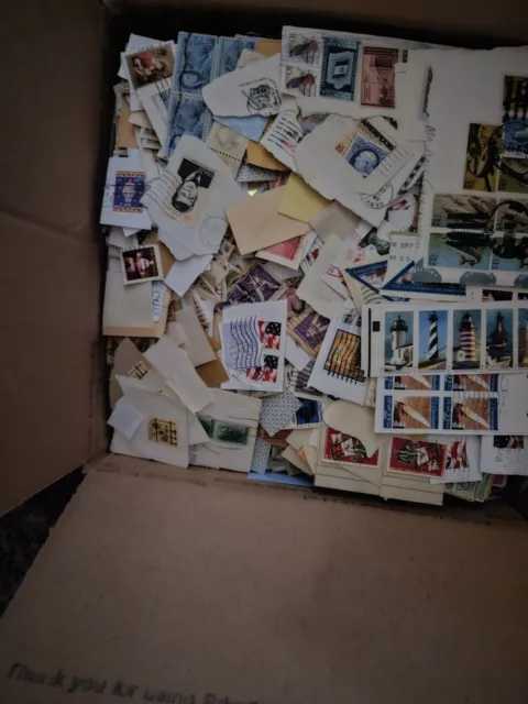 6.5 pounds of US postage stamps Box lot hoard on Single Cut paper .