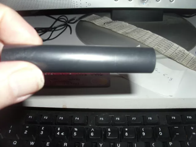 01 'Small Black Coloured Plastic Tube'