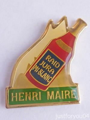 Bouteille raid Jura Mont-blanc Pin's Henri Maire Bouteille raid Jura Mont-blanc Pin's Henri Maire