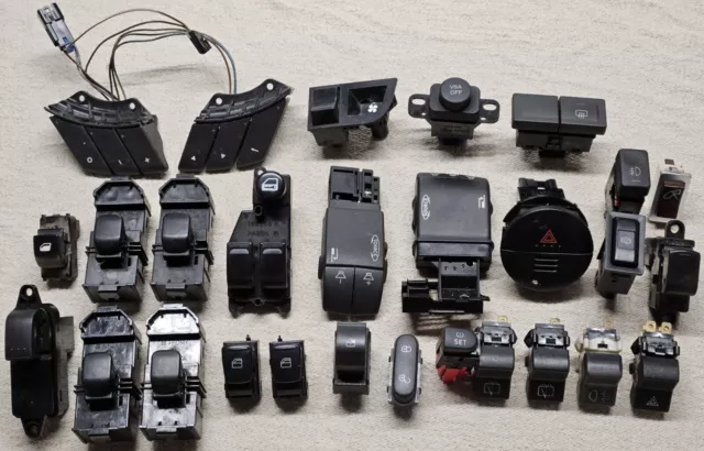 Job lot of 28 assorted car switches