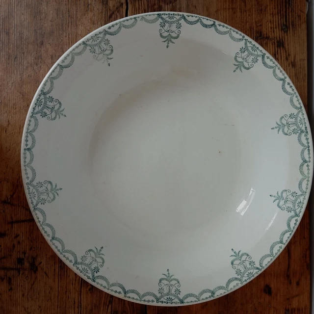 Oval plate Moulin des Loups in blue and red ceramic with a floral design