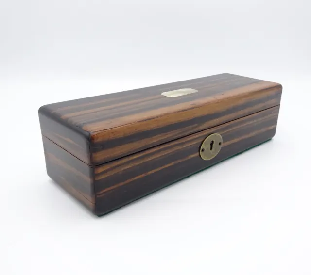 Antigua caja rectangular victoriana forrada de seda Coromandel