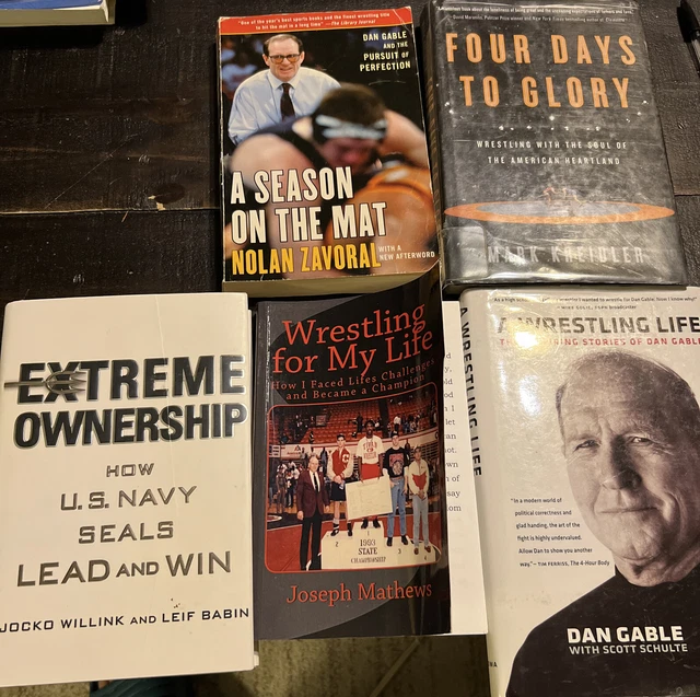 Wrestling books. Dan Gable A Wrestling Life. Four Days to Glory. Season on Mat.