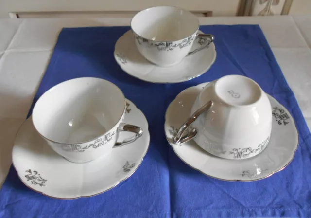 Lot De 3 Tasses Soucoupes Art Deco En Porcelaine  Contour Et Motif Argentes
