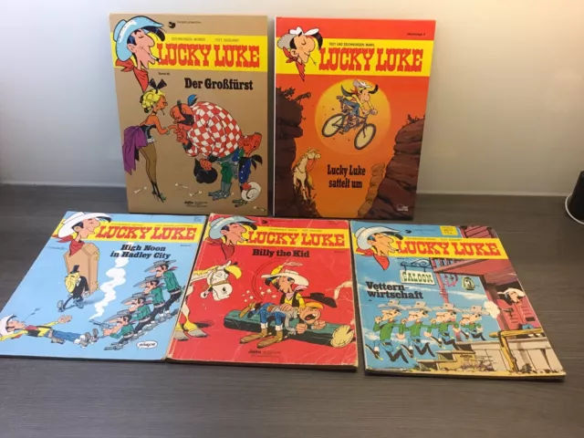 5 Bände Lucky Luke - Nr. 21, 37, 46, 67 und Hommage 3