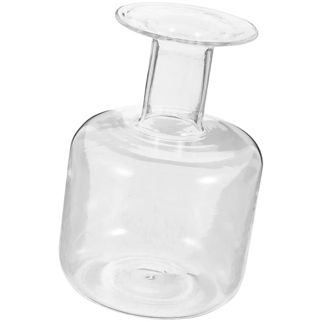 Hermosos centros de mesa de mesa con botella de vidrio transparente botella de flores