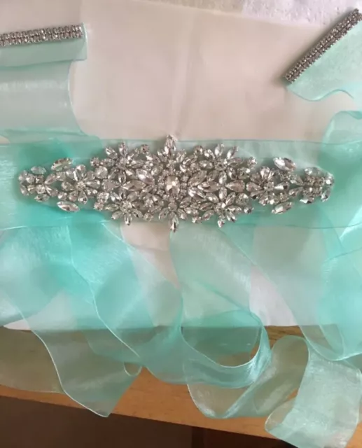 One Of A Kind Handmade Crystal In Silver Setting With Cyan Organza Ribbon