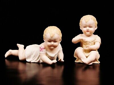 Pair Of Antique German BISQUE Piano Babies Doll Figurine.