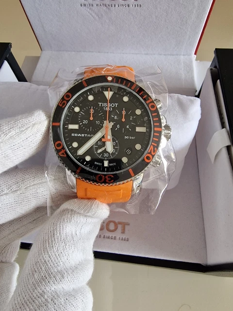 Tissot orange hotsell and black watch