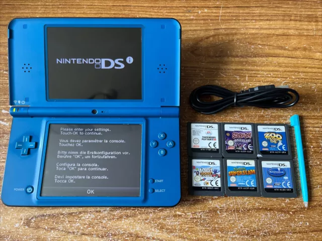 Nintendo DSi XL Blue Handheld Console Bundle +6 Games & Charger