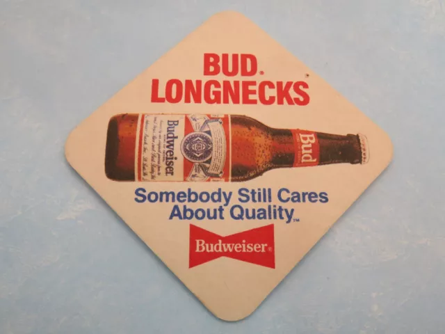 Beer Coaster: 1989 Anheuser Busch Budweiser Bud Longnecks ~ Caring About Quality