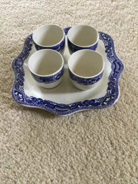 Vintage Set Of Four Blue And White Egg Cups On Plate