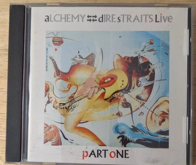 Dire Straits Live Alchemy 2-CD Set 1984 WB Part 1 and 2 Writing on discs Dire Straits Live Alchemy 2-CD Set 1984 WB Part 1 and 2 Writing on discs